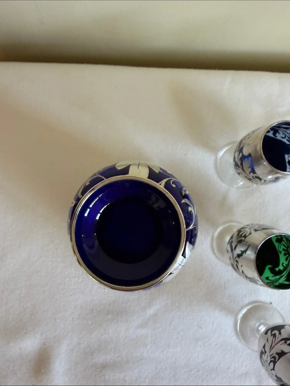 Cobalt blue glass with sterling silver over lay decanter.